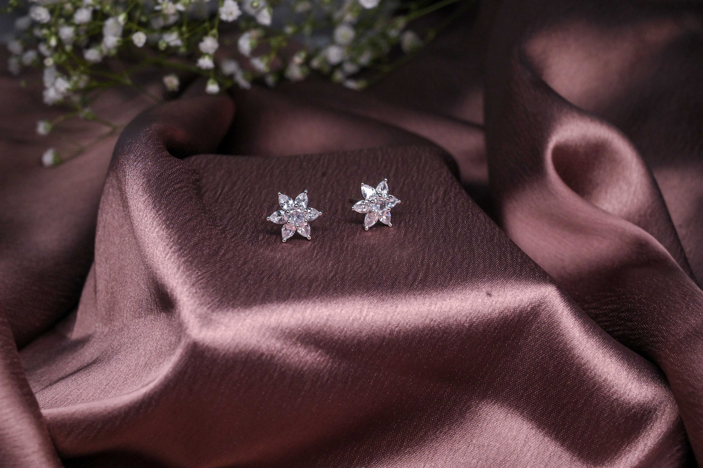 Elegant Six Petal AD Stud Earrings